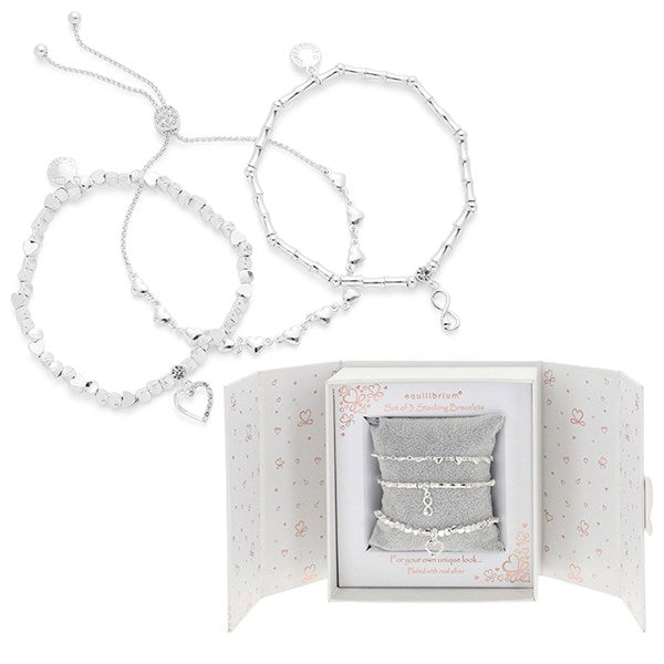 Three silver plated modern stacking bracelets