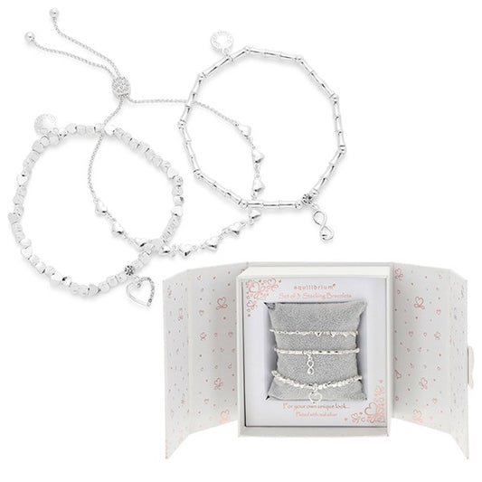 Three silver plated modern stacking bracelets